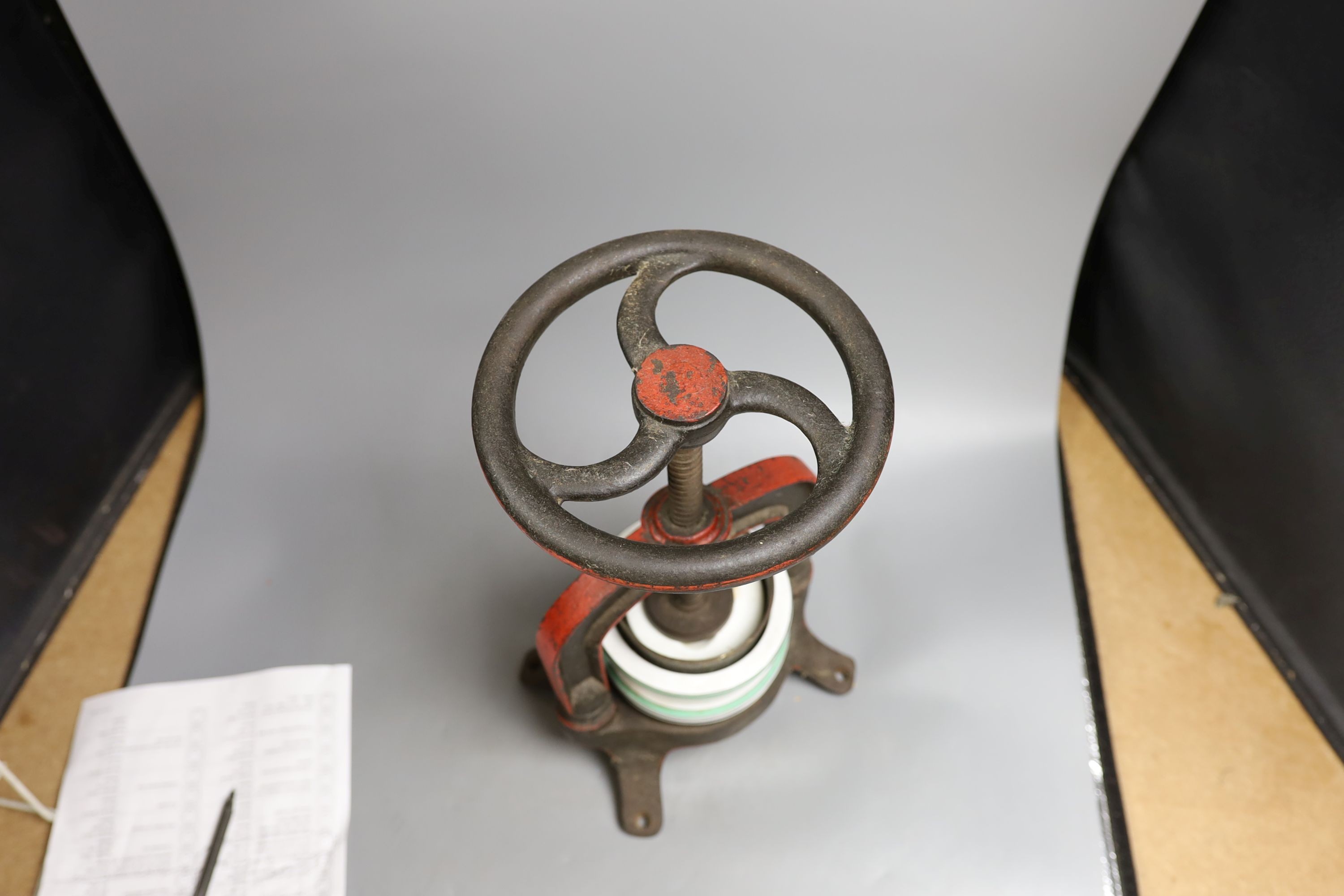 A French cast iron and ceramic pâté press, 39 cm high